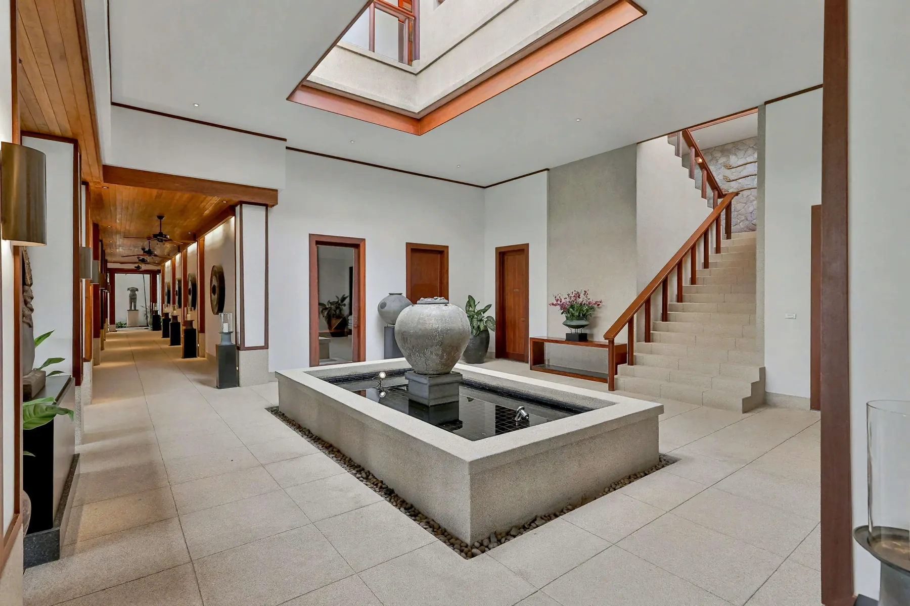 Level 2 atrium with reflecting pool and staircase