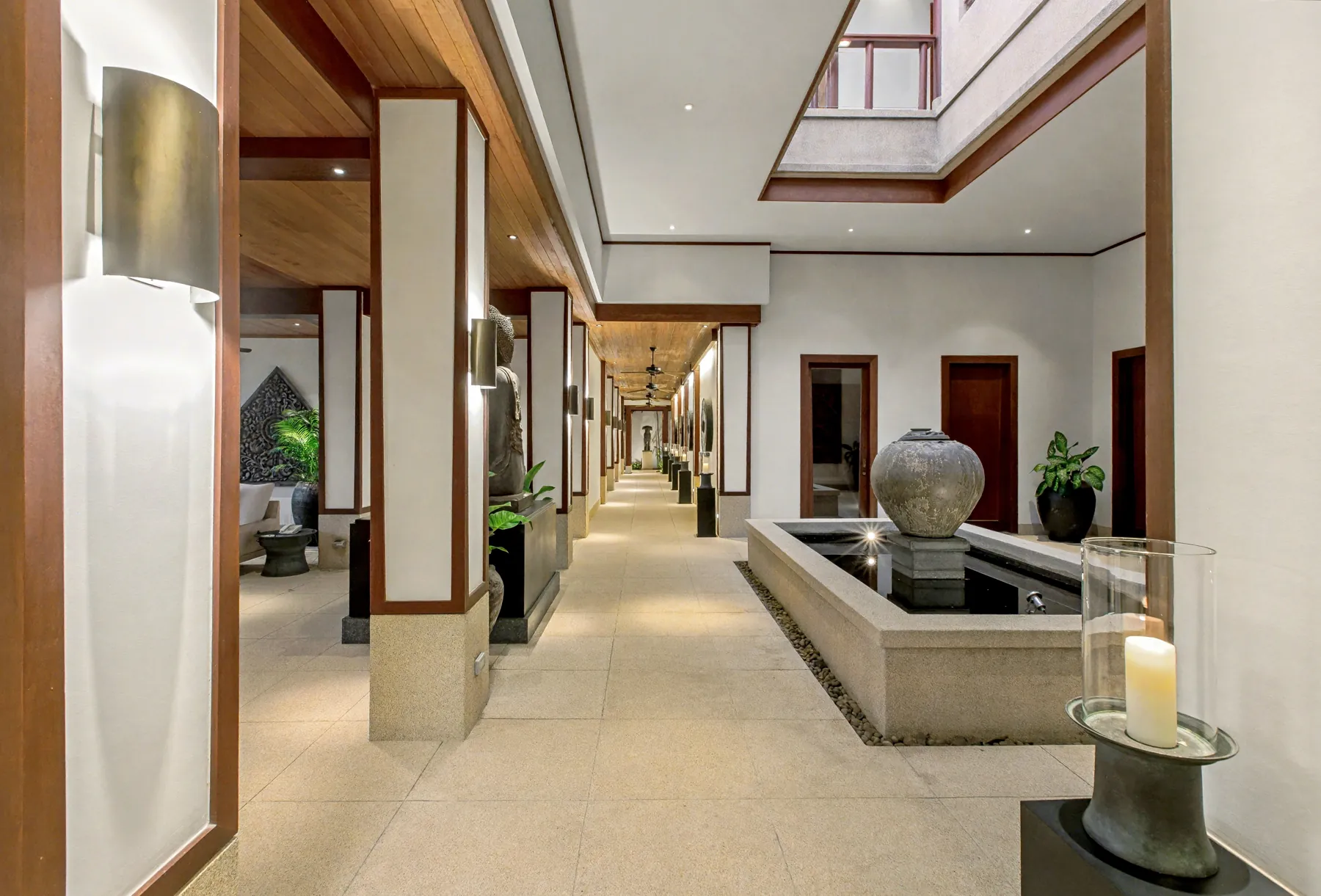 Level 2 corridor with reflecting water feature and lantern