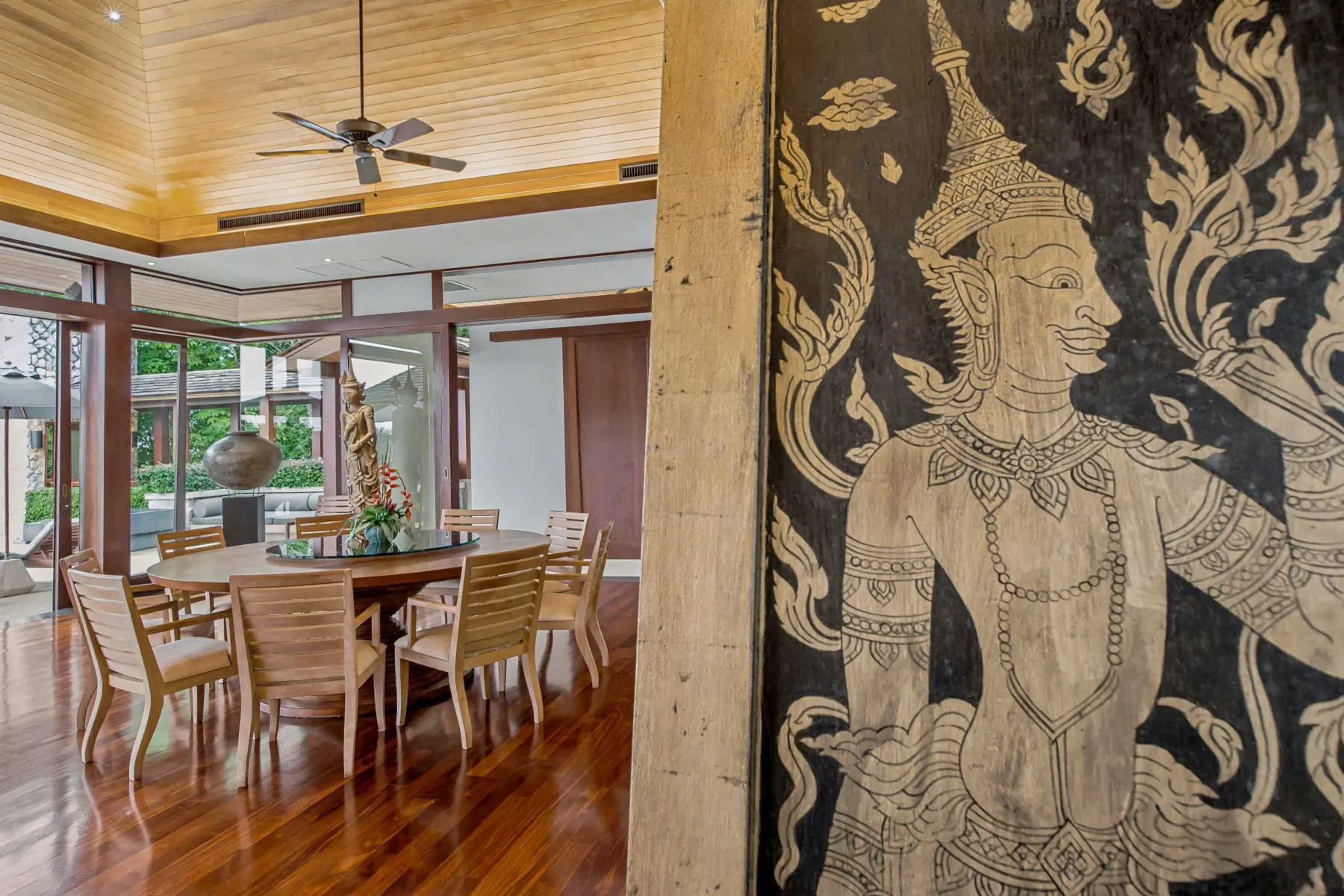 Indoor dining room for 12 guests with Thai lacquer art