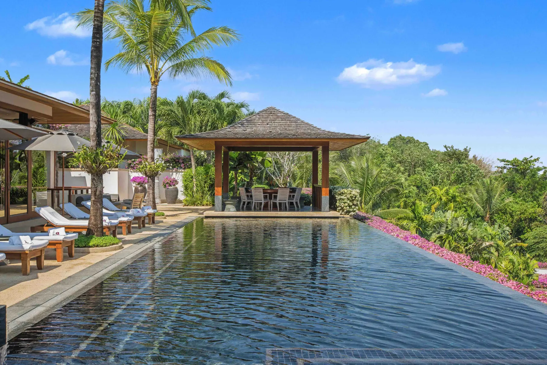 Poolside sala at the end of the infinity pool